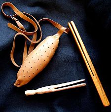 Knitting equipment from the British Isles: Knitting belt and two knitting sheaths