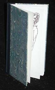 3/4 bound book with cloth and hand-marbled paper