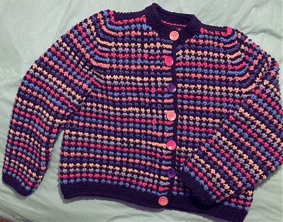 photo of almost finished striped cardigan