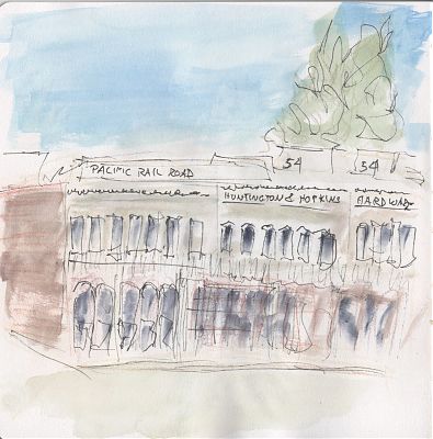 A line and wash sketch of a two story building from the 1850s with signage on the top reading Pacific Rail Road, Huntington & Hopkins, and Hardware.