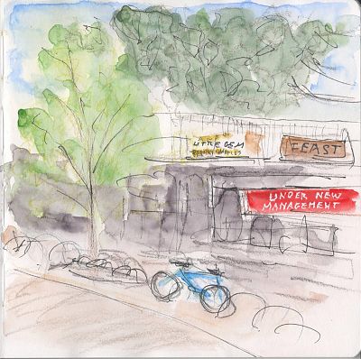 A line and wash sketch of a streetside with a tree in front of a restaurant and a bicycle parked near the restaurant. Signs on the building read Little Gem Belgian Waffles, FEAST, and UNDER NEW MANAGEMENT, the latter in white letters of a red banner.