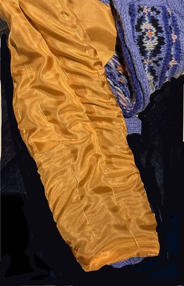 photo of a tacked-in lining on a knit sweater
